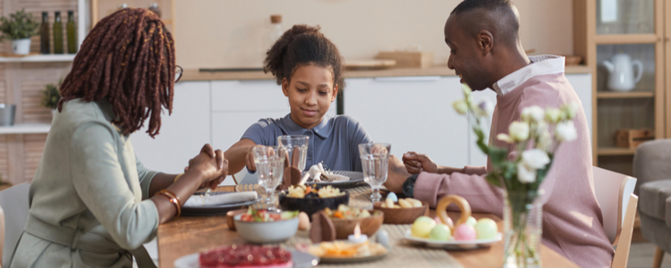Happy family enjoying union made Easter dinner 